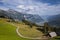 Stunning aerial view of the picturesque mountains with rural buildings