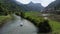 Stunning aerial view of a tourists boat sailing along river at sunset. Sunset Cruise is a slow-boat cruise