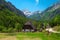 Stunning alpine landscape with rural houses in Soca valley, Slovenia