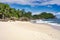 Stunning beachscape of Mahe Island in Seychelles featuring sandy beach and lush vegetation