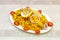 Stunning Biryani Indian Rice Recipe Served on a Tray with Cherry Tomatoes, Red Onion Rings