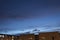 Stunning blue and violet sunset at blue hour with venus planet at the right top of composition and residential units buildings