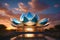 a stunning building takes the shape of an immense glass lotus flower