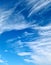 Stunning cirrus cloud formation panorama in a deep blue sky