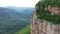 Stunning cliffs in the clouds - shooting from a copter in the village of Mezmay in Russia