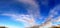 Stunning colorful sunset sky panorama showing beautiful cloud formations in high resolution