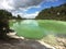 The stunning coloured geo thermal pools with steam at Wai-O-Tapu just outside of Rotorua, New Zealand