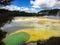 The stunning coloured geo thermal pools with steam at Wai-O-Tapu just outside of Rotorua, New Zealand