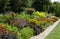 Stunning, colourful mixed perennial flower borders at the RHS Wisley garden, Surrey UK.