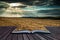 Stunning countryside landscape wheat field in Summer sunset conceptual book image