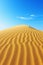 Stunning desert landscape vivid blue sky contrasting with the radiant yellow sand