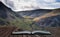 Stunning detail landscape image of mountain of Tryfan near Llyn Ogwen in Snowdonia during early Autumn coming out of pages of open