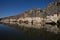 Stunning Devonian limestone cliffs of Geikie Gorge reflected in the Fitzroy River