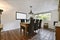 A stunning dining room with a solid wooden table