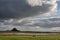 Stunning dramatic landscape image of Lindisfarne, Holy Island in Northumberland England during Winter