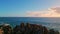 Stunning drone deep ocean surface waving under beautiful blue sky summer day.