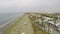 Stunning drone shot along empty beach near hotel in Cyprus, deserted area