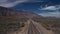 Stunning drone view of desert asphalt road with scenic rocky mountain at Baja California, Mexico