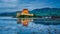 Stunning dusk over lake at Eilean Donan Castle, Scotland