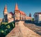 Stunning evening view of Hunyad Castle Corvin`s Castle.