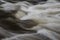 Stunning fine art collection of landscape images of long exposure detail of fast flowing water over rocks in river