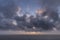 Stunning fine art landscape image of view from Hartland Quay in Devon England durinbg moody Spring sunset