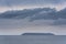 Stunning fine art landscape image of view from Hartland Quay in Devon England durinbg moody Spring sunset