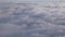 Stunning footage of aerial view above clouds from airplane