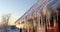 The Stunning Formation of Icicles Hanging from House Roofs