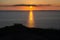 Stunning golden sunset from the Cliffs of Moher looking out towards the island of Inisheer, Ireland