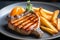 Stunning Grilled Pork Chop and fries