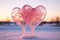 A stunning image showcasing two beautifully crafted heart shaped ice sculptures amid a snowy landscape, Ice sculpture of heart