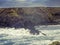 Stunning Irish seascape with rough stone coast line and powerful Atlantic ocean. Kilkee area, Ireland. Dramatic sky. Detailed