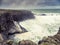 Stunning Irish seascape with rough stone coast line and powerful Atlantic ocean. Kilkee area, Ireland. Dramatic sky. Detailed