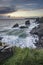 Stunning landcape image of Bedruthan Steps on Cornwall coast in