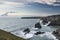 Stunning landcape image of Bedruthan Steps on Cornwall coast in