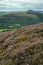 Stunning landscape image of Bamford Edge in Peak District National Park during late Summer with heather in full blom