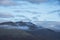 Stunning landscape image of Blencathra covered in low cloud fog and mist viewed from Walla Crag in Lake District