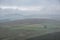 Stunning landscape image of the view from Higger Tor in the Peak District National Park in Egnland with light fog across the