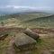 Stunning landscape image of the view from Higger Tor in the Peak District National Park in Egnland with light fog across the