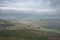 Stunning landscape image of the view from Higger Tor in the Peak District National Park in Egnland with light fog across the