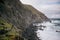 Stunning landscape shot of a rocky seashore featuring a rugged hillside, La Gomera, Spain