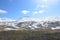 Stunning landscape of snowcap mountains with clear blue skies