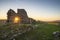 Stunning landscape sunset image over abandoned Foggintor Quarry