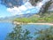 Stunning landscape view on the blue Adtiatic Sea and mountains framed by the pine trees near the Sveti Stefan, Montenegro