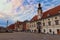 Stunning landscape view of The Rotovz Town Hall Square. Medieval Plague Column and ancient colorful building at the background.