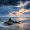 Stunning landscapedawn sunrise with rocky coastline and long exp