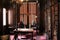 Stunning library, with walls lined with books, table and chair set in the center, Victoria Mansion,Portland Maine,2016