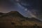 Stunning majestic digital composite landscape of Milky Way over Buttermere in Lake District