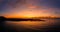 Stunning mid aspect aerial panoramic view of the early morning sunrise over the island of Lobos near Corralejo in Fuerteventura